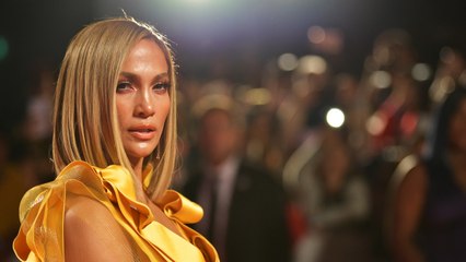 Jennifer Lopez Casually Kicked Off Her Week by Lounging in Lingerie and a Silk Robe