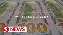 Why did Fitch downgrade America's credit rating?