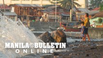 Seawaters flood the Sta. Ana Port area in Davao City