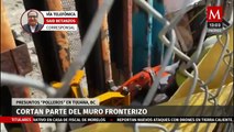 Presuntos 'polleros' cortan parte de muro fronterizo en Tijuana