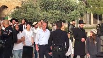 Group of Jewish people tours Jerusalem's al-Aqsa mosque compound