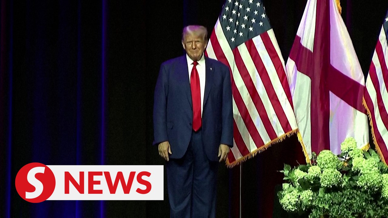 Trump denounces 'fake charges in sham indictment'