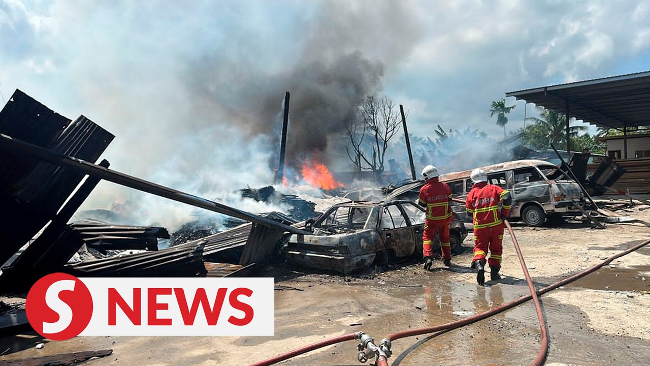 Dozens of vehicles, three buildings razed in Pu...