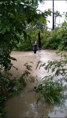 Villagers risking their lives with the help of rope