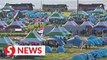 South Korea presses on with world scout jamboree, UK and US contingents move out