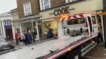 Shocking witness footage shows moments after truck crashes into shop
