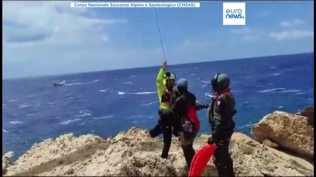 Migrants rescued after clinging to rocks near Lampedusa for days