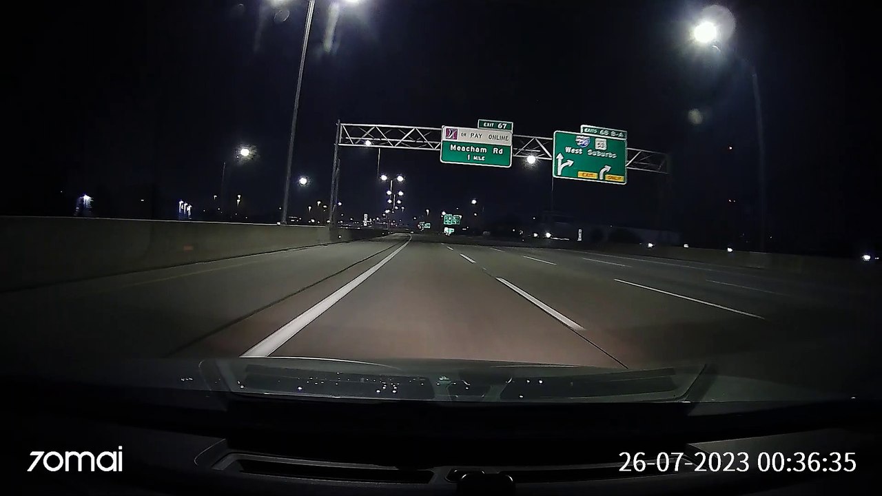 Sign Slips From Truckbed