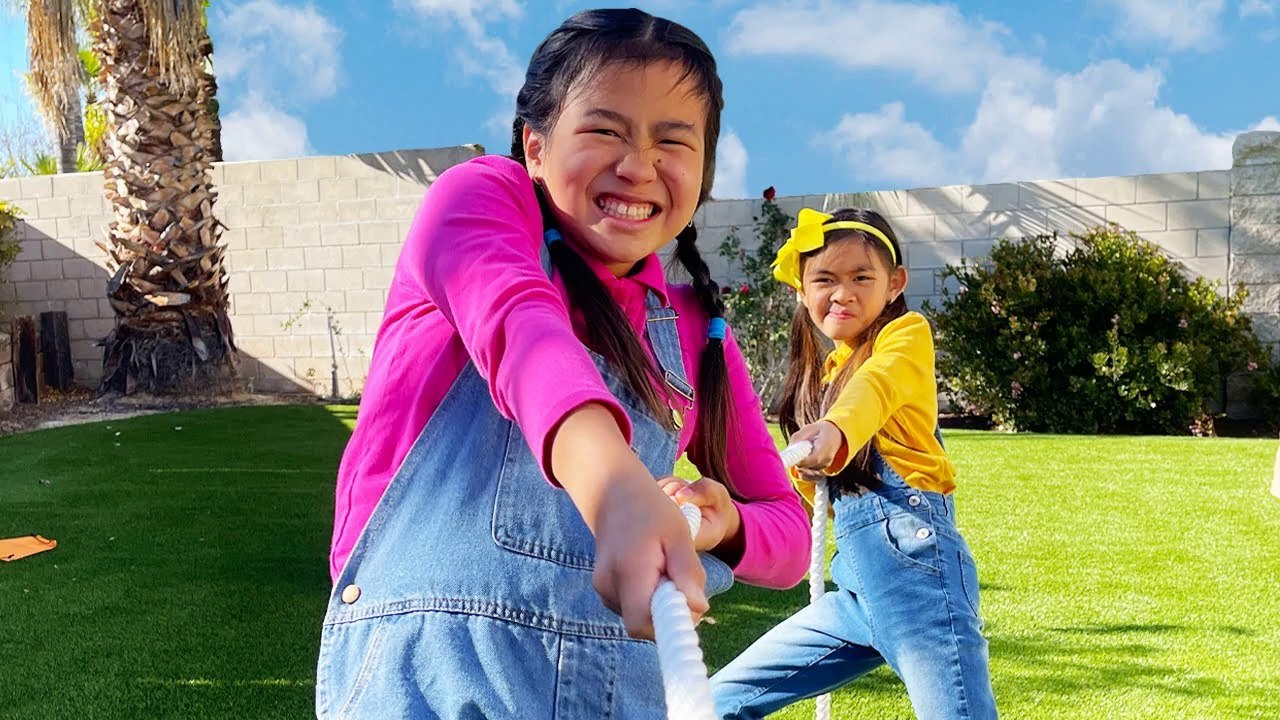 Jannie and Charlotte Play Tug of War Game Challenge for Kids Exercise Eat Healthy & Get Strong