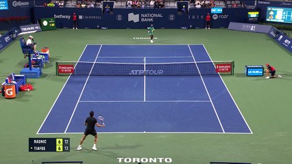 Tiafoe wins first set against Raonic after rare net touch winner