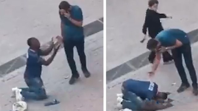 İstanbul'da yakalanan kaçak göçmen, kendisini bırakması için sivil polisin ayaklarına kapandı