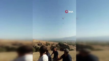 Tam isabet! Yangın söndüren pilota vatandaştan övgü