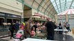 Stall holders discuss summer events in the Grainger Market in Newcastle