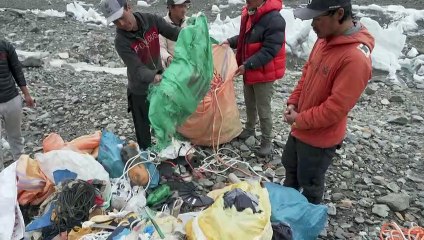 Pakistan climber cleanses K2 as shrine to fallen father