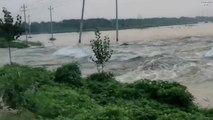 Sel tehlikesi yüzünden 'kırmızı' alarm verilen Çin’de taşan Daqing Nehri’ne ait görüntüler kameralara yansıdı