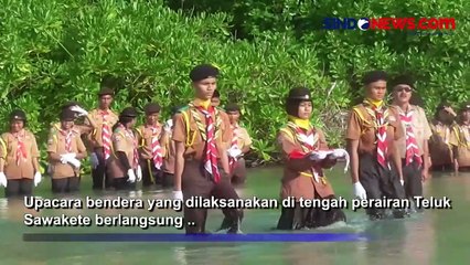 Unik, Perayaan Hut Pramuka di Tengah Aliran Teluk Sawakete, Nias Utara