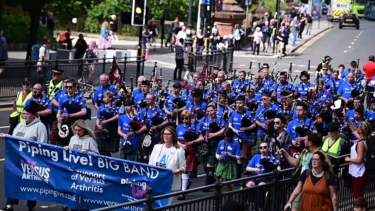 Pipers march through Glasgow streets for Piping Live! 2023 Big Band