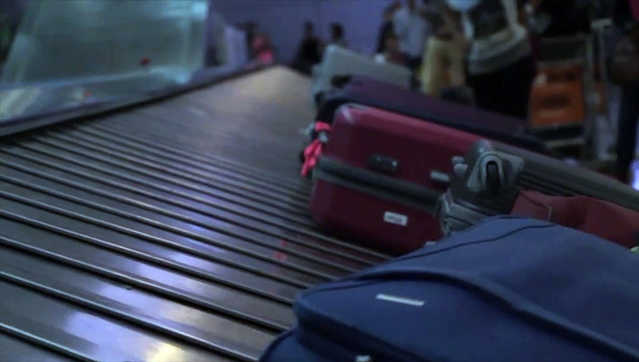 Aeropuerto - Valijas moviendose