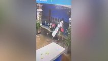 Hotel guests throwing furniture into pool caught on camera