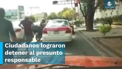 Captan persecución a taxista que huyó tras atropellar a motociclista en CDMX