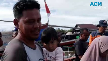 Moment missing Indonesian captain of capsized boat reunited with his family