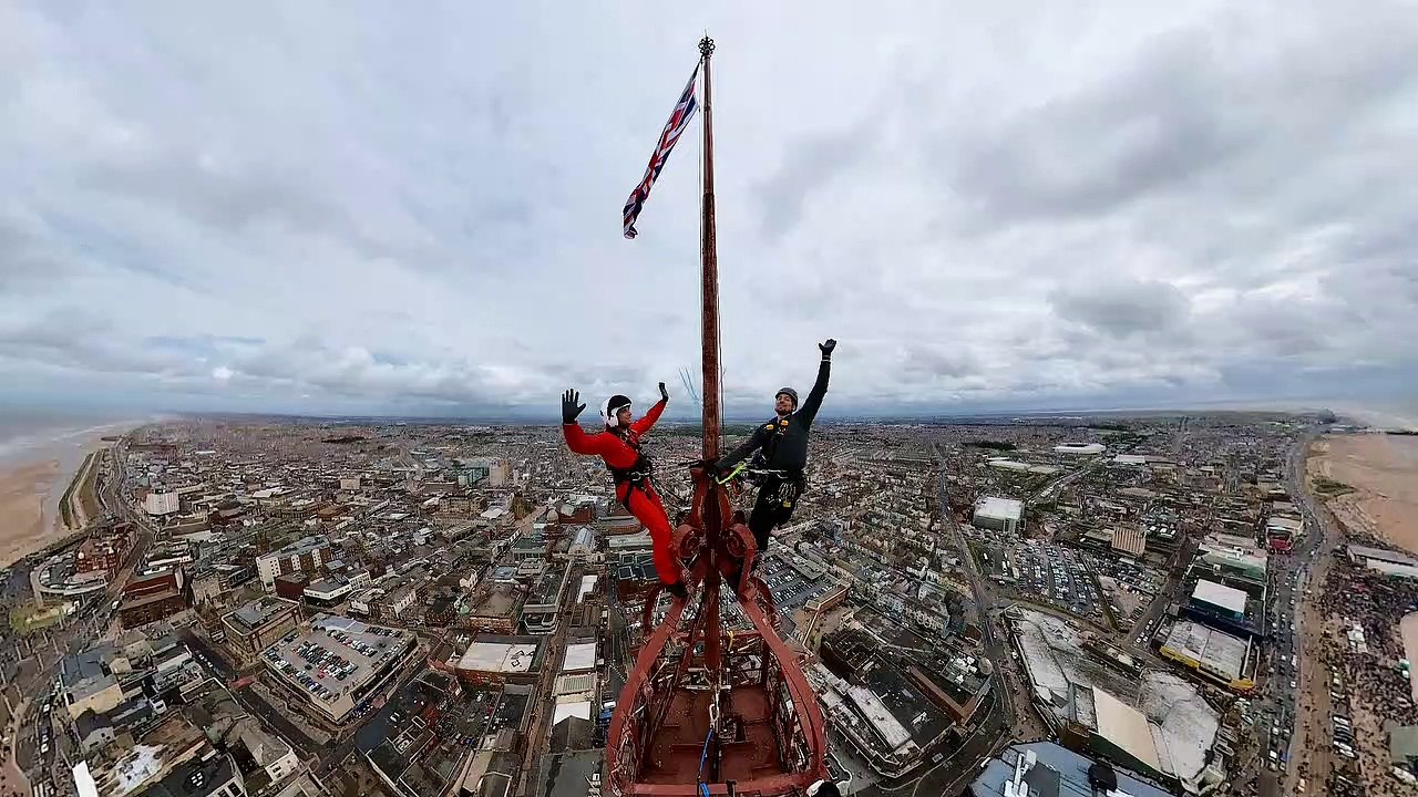 Two thrill-seekers scaled the 518ft Blackpool T...