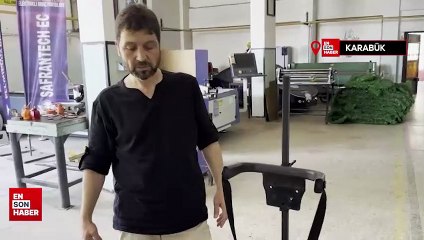 Karabük'te hiç görmediği engelli çocuğa yürüteç yaptı
