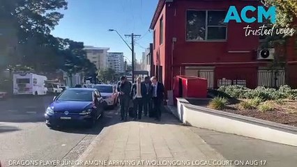 Dragons player Junior Amone arriving at Wollongong courthouse with his father on August 17.