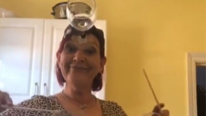 Fun Grandma wraps wine glasses on her forehead and chest to make a tune *Fun Video*