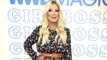 Tori Spelling is said to have wept when she found out her dad Aaron Spelling left most of his fortune to her mum
