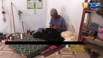 سعيدة: خياطة العباءة التقليدية.. حرفة الأجداد يحافظ عليها عمي عبد القادر