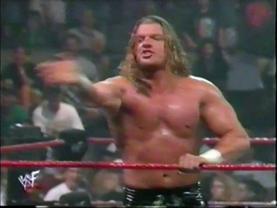 Triple H of D-Generation-X Encourages WWE Fan to Flash Her Boobs at WWF 'Raw is War' event (July 20, 1998)