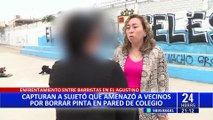 El Agustino: vecinos borran pintas de colegio y reciben amenazas