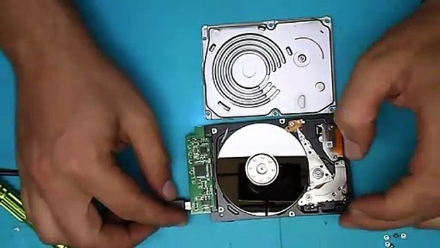 Hard disk drive components under pressure