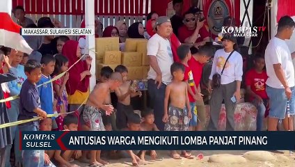 Antusias Warga Mengikuti Lomba Panjat Pinang