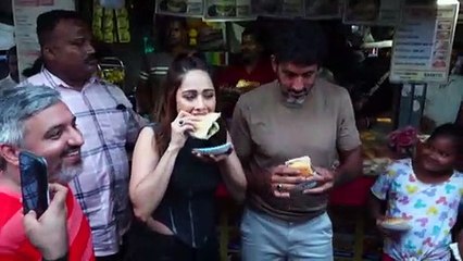 Nushrratt Bharuccha Enjoys Spicy Vada Pav Near Mithibai College In Mumbai