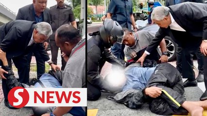 Ahmad Zahid stops to help accident victim in KL