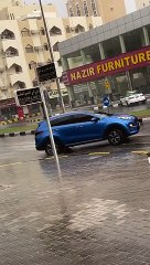 Garbage Drum Floats Down Street In Heavy Rain