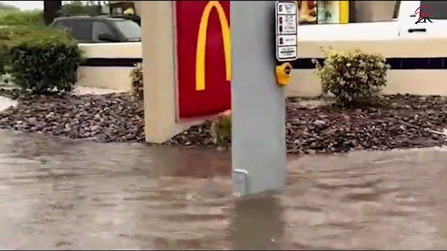 'There is no way in or out': Palm Springs is totally cut off and 911 is down as Storm Hilary soaks from coast to desert - with a MOAT surrounding LA's Dodger Stadium and Burning Man under threat