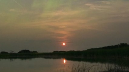 Breathtaking sight of dazzling Aurora dancing through moon rise *Timelapse*