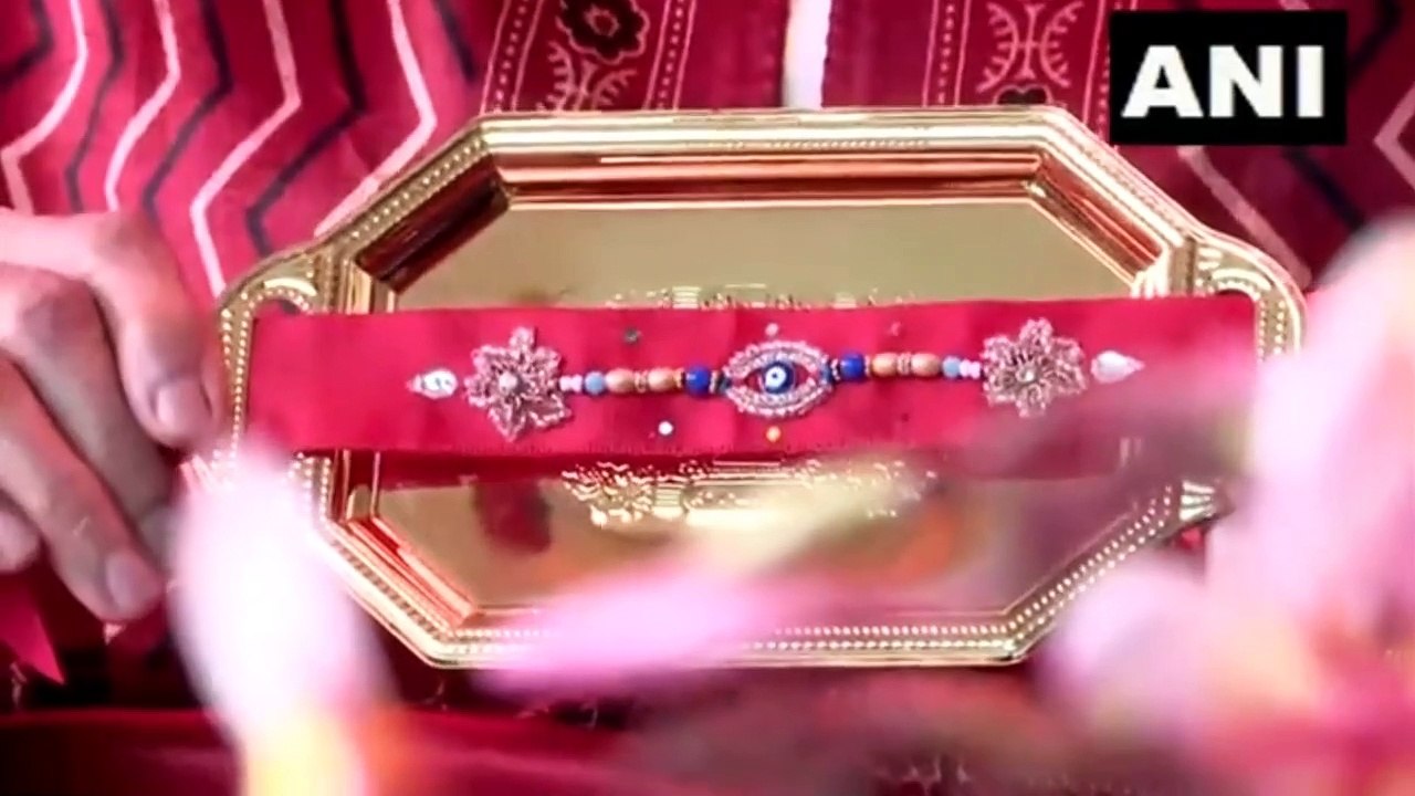 PM Modi's Pakistan-origin rakhi sister makes rakhi for him - video ...