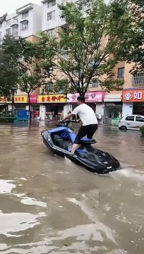 Jet Skiing Through Flooded Streets