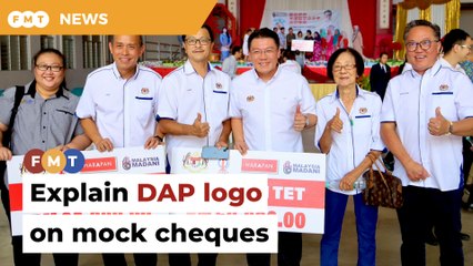 Umno Youth chief wants Nga to explain DAP logo on school donation cheques