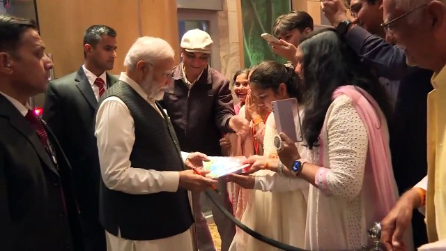 PM Modi's Friendly Interaction_ Greeting Youth and Signing Autographs