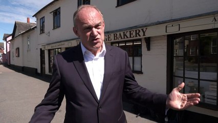 Ed Davey tucks into sweet treat on trip to local business
