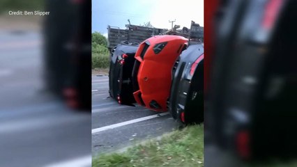 Cars damaged after transporter overturns near Brands Hatch