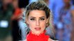 Amber Heard won't be prosecuted over the illegal importation of her dogs into Australia eight years ago