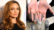 Angelina's Tattoo Artist Reacts To Speculation Her New Middle Finger Tattoos Are Brad Pitt-Related