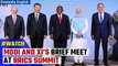 BRICS Summit: PM Modi, President Xi interact briefly at the Summit, shake hands | Oneindia News