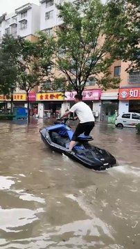 Jet Skiing Through Flooded Streets